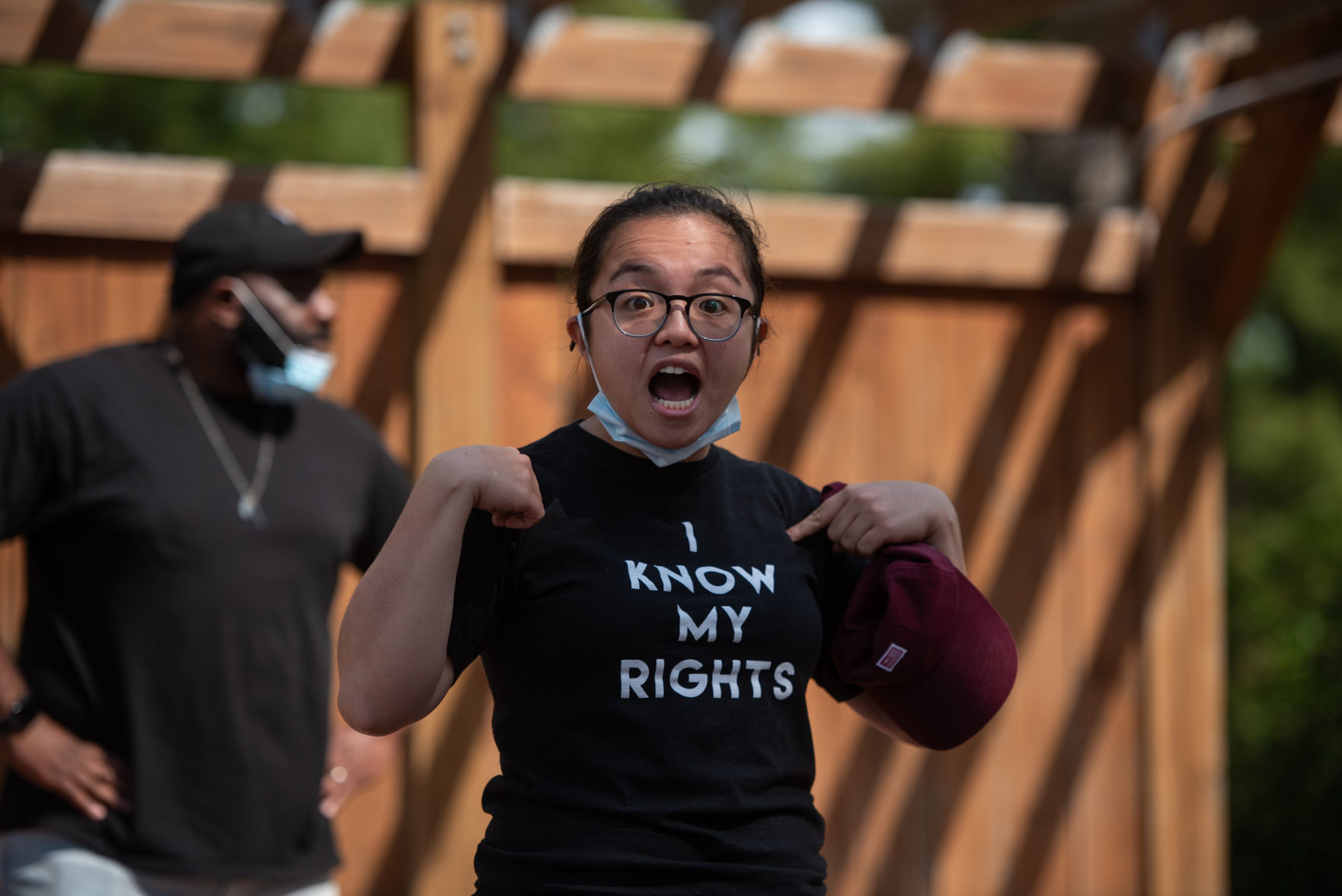 Fanny Fang, running to be the Riley County Commissioner for District 2, speaks at a peaceful protest in honor of George Floyd at Triangle Park on Saturday.